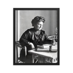 Maria Montessori framed print on a plain backdrop in size 16"x20".