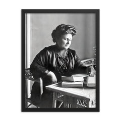 Maria Montessori framed print on a plain backdrop in size 18"x24".