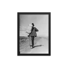 Migrant workers on the California road by Dorothea Lange framed print on a plain backdrop in size 12"x16".
