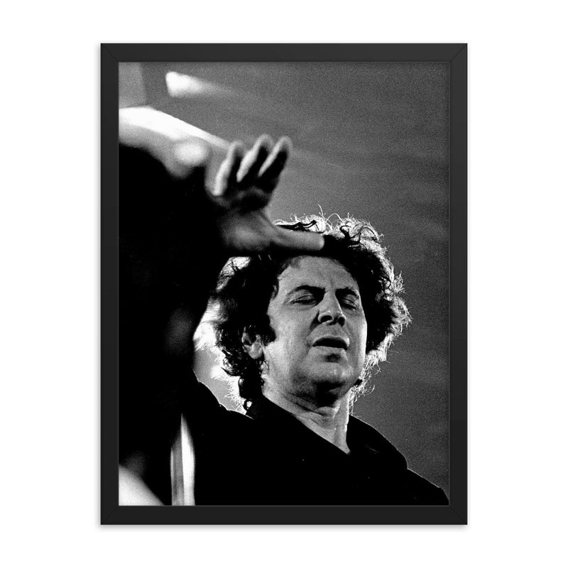 Mikis Theodorakis framed print on a plain backdrop in size 18