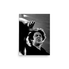 Mikis Theodorakis poster on a plain backdrop in size 12"x16".