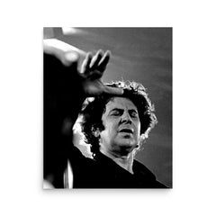 Mikis Theodorakis poster on a plain backdrop in size 16"x20".