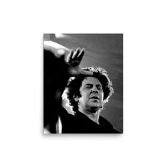 Mikis Theodorakis poster on a plain backdrop in size 8"x10".