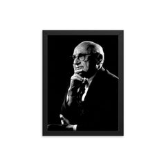 Milton Friedman framed print on a plain backdrop in size 12"x16".