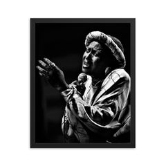 Miriam Makeba framed print on a plain backdrop in size 16"x20".
