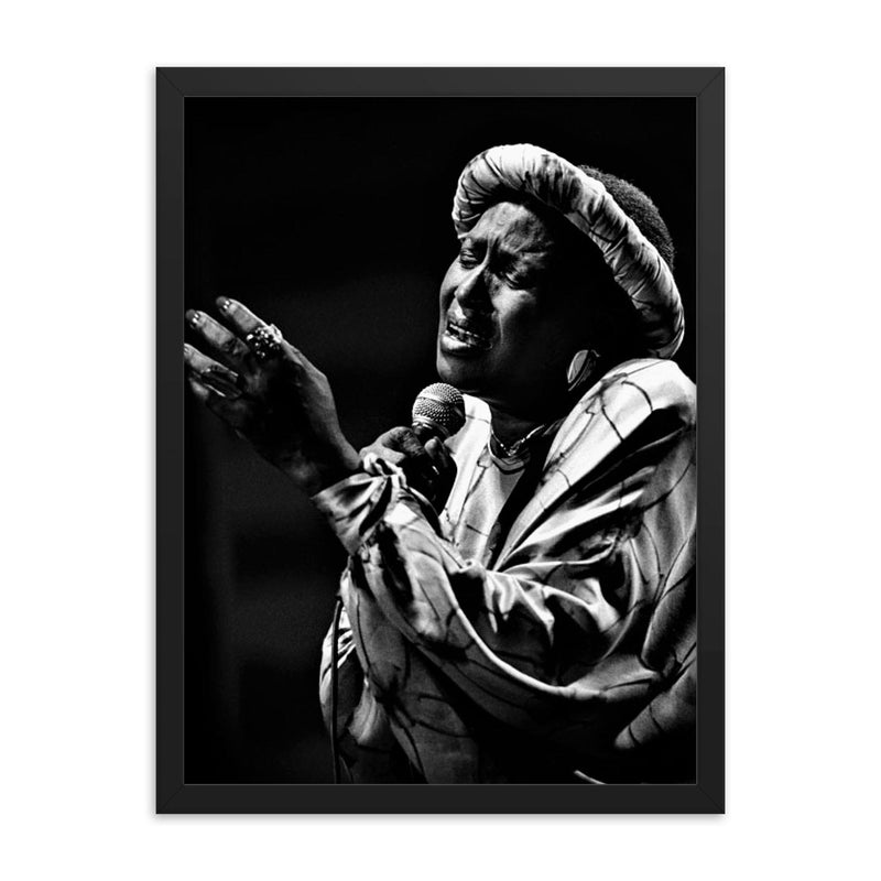 Miriam Makeba framed print on a plain backdrop in size 18