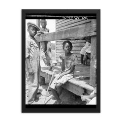 Mississippi Delta children by Dorothea Lange framed print on a plain backdrop in size 18"x24".