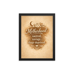 Motherhood sacred savage sleep deprived framed print on a plain backdrop in size 12"x16".