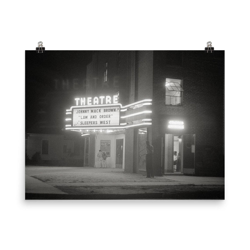 Movie Theater at Night - A movie theater at night with a brightly lit marquee, Greensboro, Georgia, 1940 poster on a plain backdrop in size 8