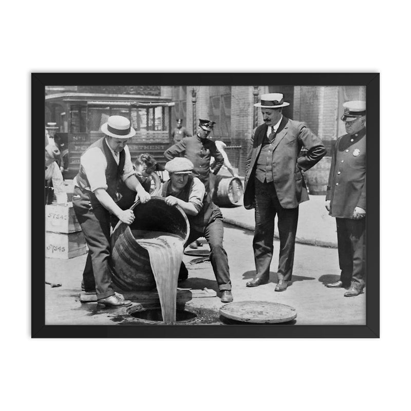 New York City Police raiding bootleg liquor during the Prohibition era, New York City, 1921 framed print on a plain backdrop in size 18