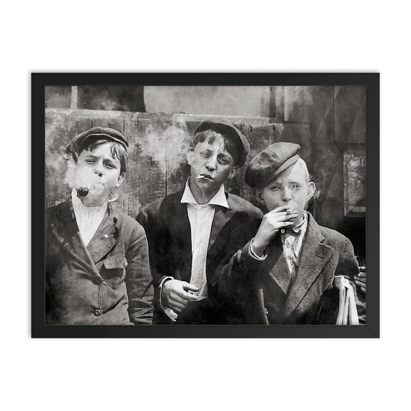 Newsies (newspaper boys) pose for a portrait while smoking - St Louis, Missouri, 1910 framed print on a plain backdrop in size 18
