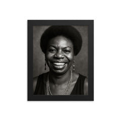 Nina Simone smiling, black and white portrait framed print on a plain backdrop in size 8"x10".