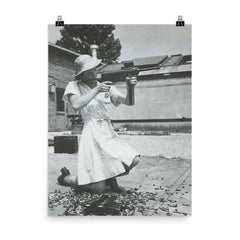 Nurse with an M-3 Grease Gun, WWII 1940s poster on a plain backdrop in size 8"x10".