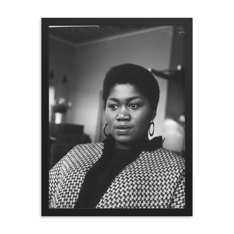 Odetta framed print on a plain backdrop in size 18