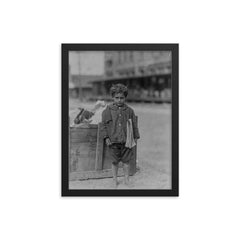 One of America’s Youngest Newsboys, Tampa, Florida, 1913 framed print on a plain backdrop in size 12"x16".