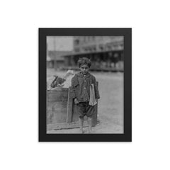 One of America’s Youngest Newsboys, Tampa, Florida, 1913 framed print on a plain backdrop in size 8"x10".