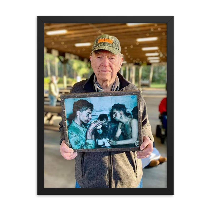 Pfc Faris Tuohy Holding a Photo After Battle on Eniwetok Atoll, 1944 framed print on a plain backdrop in size 18