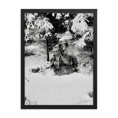 Pfc George A. Guckenberger in Foxhole, 506th PIR, 101st Airborne Division, Siege of Bastogne, January 14, 1945 framed print on a plain backdrop in size 18"x24".