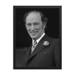 Pierre Trudeau framed print on a plain backdrop in size 18"x24".