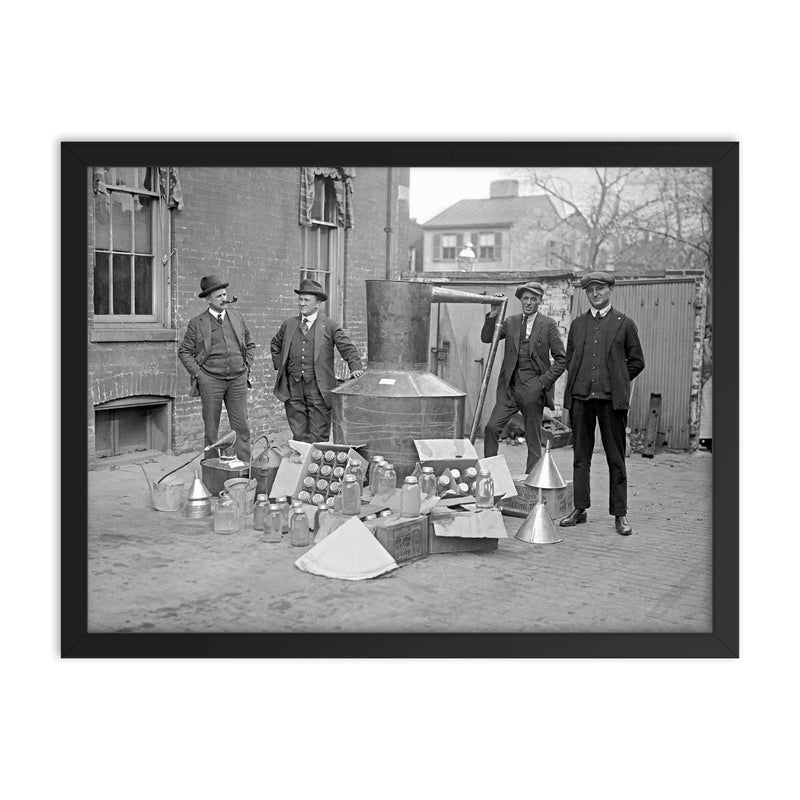 Prohibition Agents pose with a large still and equipment seized from a moonshine operation, Washington, DC 1922 framed print on a plain backdrop in size 18