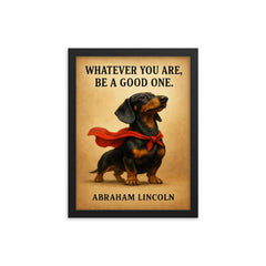 proud dachshund in superhero cape with lincoln quote whatever you are be a good one inspiring poste framed print on a plain backdrop in size 12"x16".