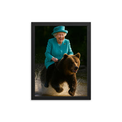 Queen Elizabeth II riding a bear framed print on a plain backdrop in size 12"x16".