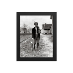 Rabbit Hunting - A boy returns home from rabbit hunting, Dillon, South Carolina, 1909 framed print on a plain backdrop in size 8"x10".