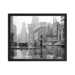 Rainy Day in Times Square - A view of Times Square on a rainy day, New York City, 1943 framed print on a plain backdrop in size 16"x20".