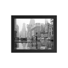 Rainy Day in Times Square - A view of Times Square on a rainy day, New York City, 1943 framed print on a plain backdrop in size 8"x10".