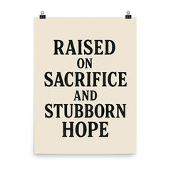 Raised on sacrifice and stubborn hope poster on a plain backdrop in size 8"x10".
