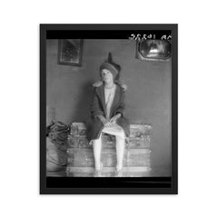 Resettled Farm Child by Dorothea Lange framed print on a plain backdrop in size 16"x20".