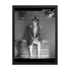 Resettled Farm Child by Dorothea Lange framed print on a plain backdrop in size 18"x24".