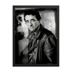 Roberto Bolano framed print on a plain backdrop in size 18"x24".