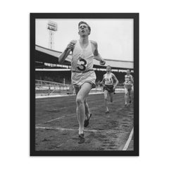 Roger Bannister framed print on a plain backdrop in size 18"x24".