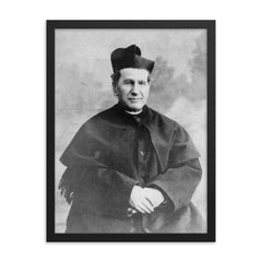 Saint John Bosco framed print on a plain backdrop in size 18"x24".