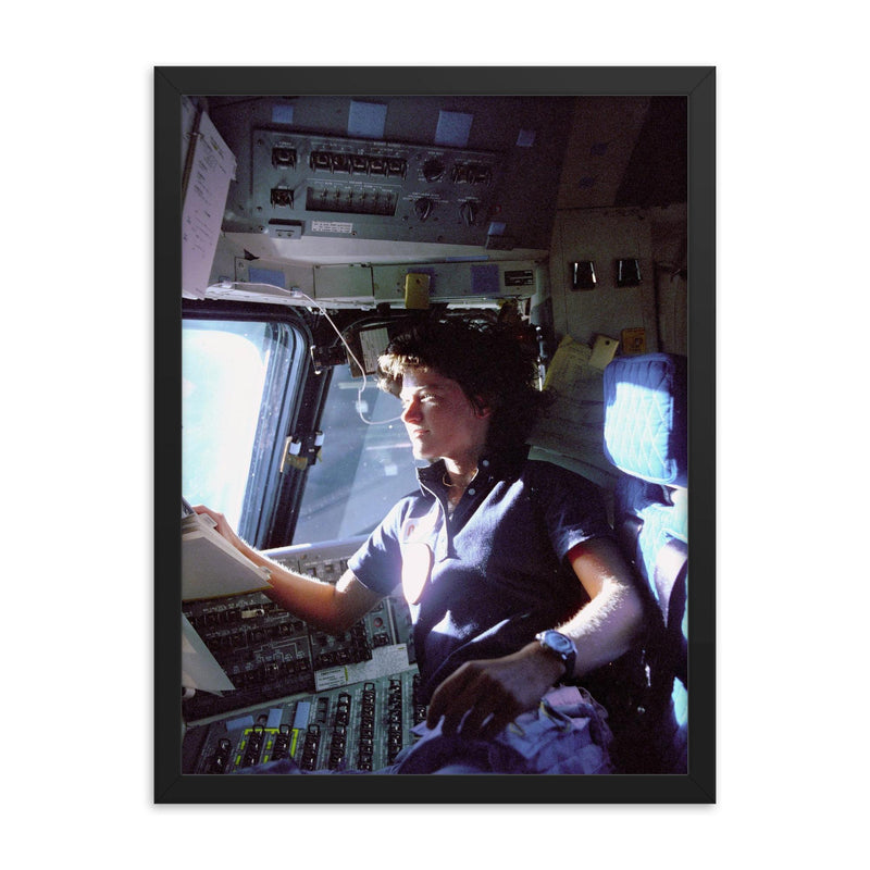 Sally Ride on the Flight Deck, 1983 framed print on a plain backdrop in size 18