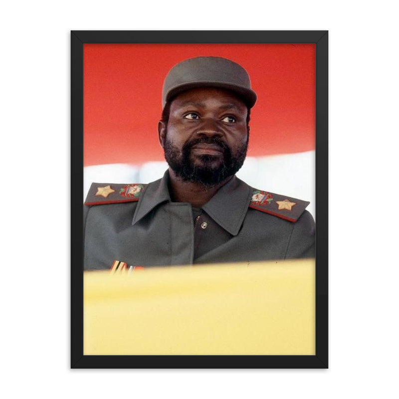 Samora Machel framed print on a plain backdrop in size 18