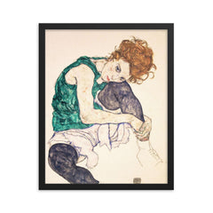Seated Woman with Bent Knee by Egon Schiele framed print on a plain backdrop in size 16"x20".