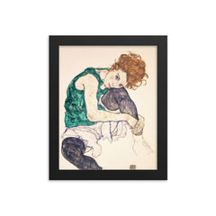 Seated Woman with Bent Knee by Egon Schiele framed print on a plain backdrop in size 8"x10".