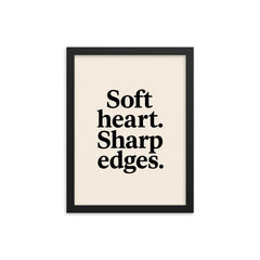 Soft heart Sharp edges framed print on a plain backdrop in size 12"x16".