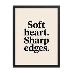 Soft heart Sharp edges framed print on a plain backdrop in size 18"x24".