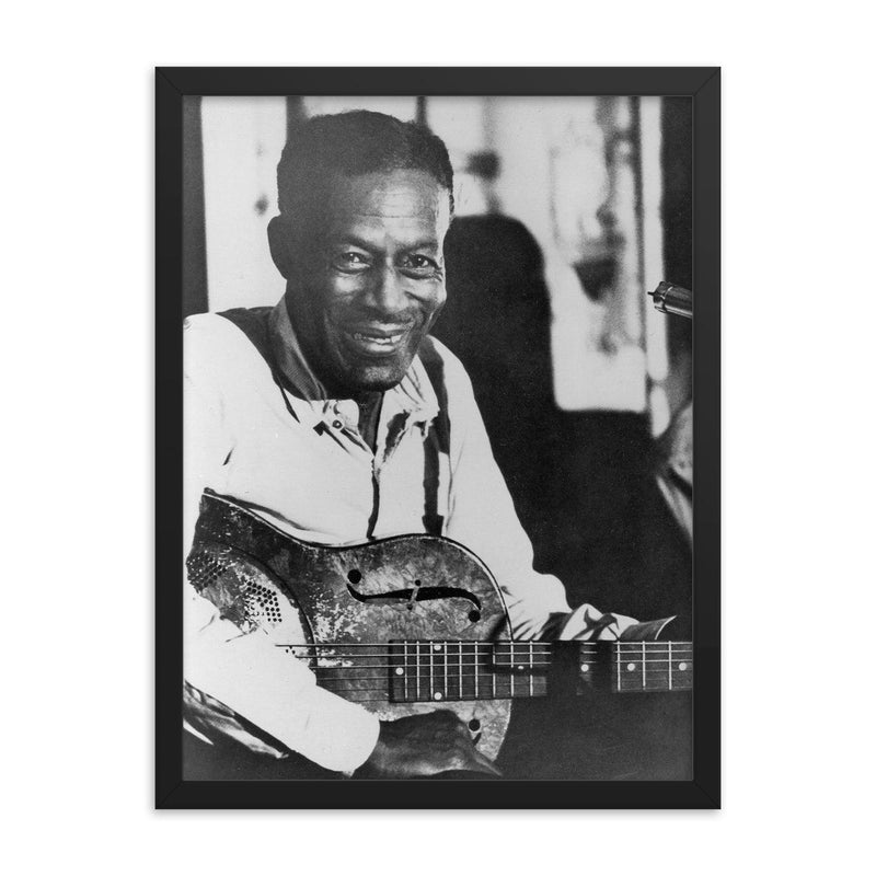 Son House framed print on a plain backdrop in size 18