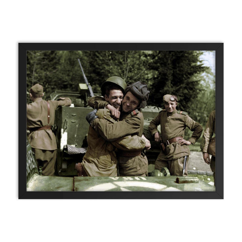 Soviet Soldier Embraces American Serviceman Near the Elbe River, 1945 framed print on a plain backdrop in size 18