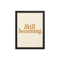 Still becoming framed print on a plain backdrop in size 12"x16".