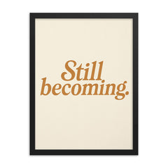 Still becoming framed print on a plain backdrop in size 18"x24".