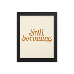 Still becoming framed print on a plain backdrop in size 8"x10".