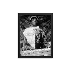 Sun Ra framed print on a plain backdrop in size 12"x16".