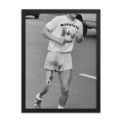 Terry Fox framed print on a plain backdrop in size 18"x24".