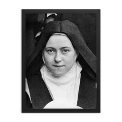 Thérese of Lisieux framed print on a plain backdrop in size 18"x24".