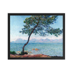 The Esterel Mountains by Claude Monet framed print on a plain backdrop in size 16"x20".